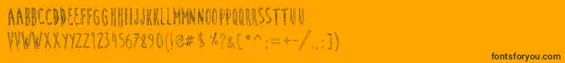 CuteCartoon Font – Black Fonts on Orange Background