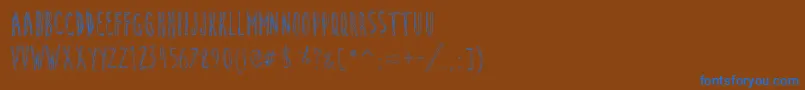 CuteCartoon-fontti – siniset fontit ruskealla taustalla
