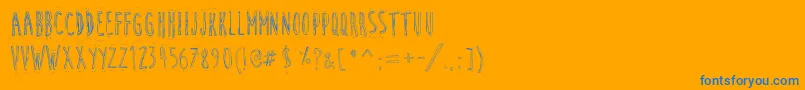 CuteCartoon Font – Blue Fonts on Orange Background