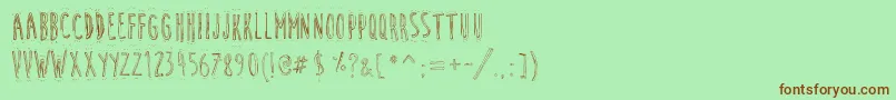 CuteCartoon Font – Brown Fonts on Green Background