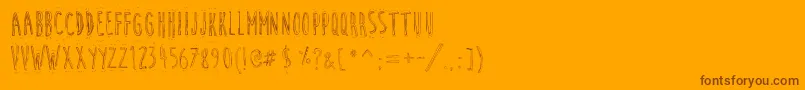 CuteCartoon Font – Brown Fonts on Orange Background
