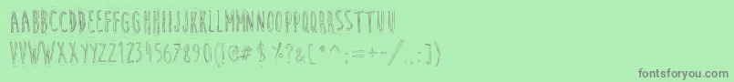 フォントCuteCartoon – 緑の背景に灰色の文字