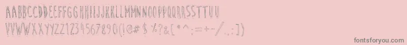 Fonte CuteCartoon – fontes cinzas em um fundo rosa