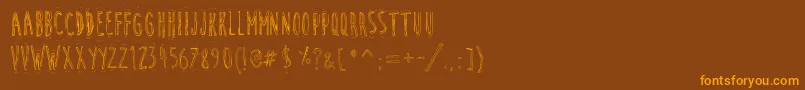 CuteCartoon Font – Orange Fonts on Brown Background