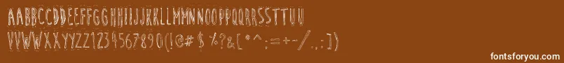 CuteCartoon Font – White Fonts on Brown Background