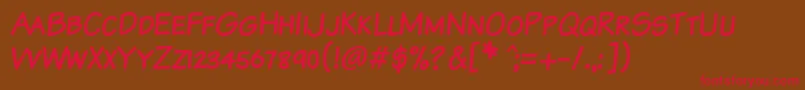 フォントKomikaTextKaps – 赤い文字が茶色の背景にあります。