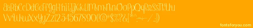 StrawberryWhippedCream2-Schriftart – Gelbe Schriften auf orangefarbenem Hintergrund