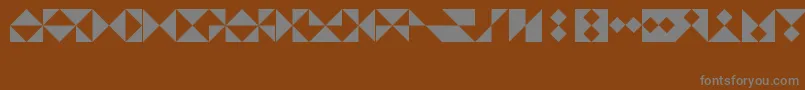 More about TrianglesLtRegular Font TrianglesLtRegular Font – Gray Fonts on Brown Background