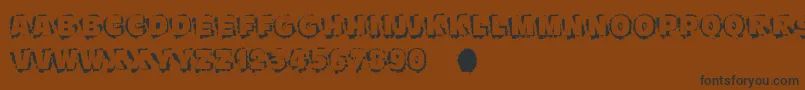 Scratchtoreveal Font – Black Fonts on Brown Background