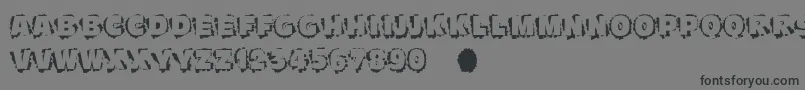 フォントScratchtoreveal – 黒い文字の灰色の背景