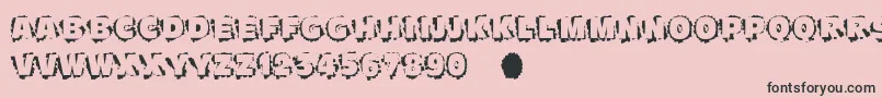 フォントScratchtoreveal – ピンクの背景に黒い文字