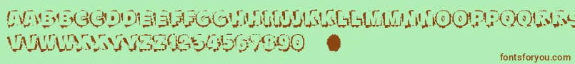 Scratchtoreveal-fontti – ruskeat fontit vihreällä taustalla