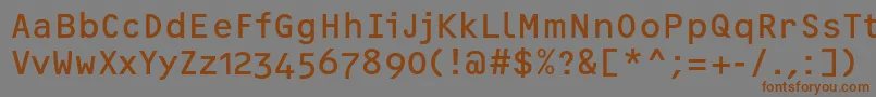 フォントOcrfRegularosfc – 茶色の文字が灰色の背景にあります。