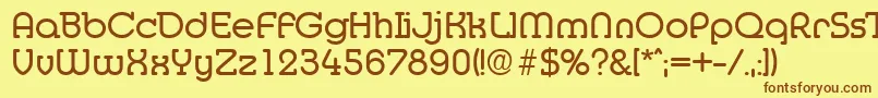 フォントMediaSerialRegularDb – 茶色の文字が黄色の背景にあります。