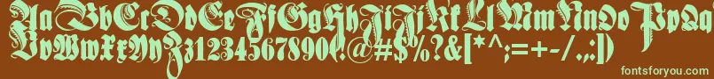 Schmaleanzeigenschriftzier Font – Green Fonts on Brown Background