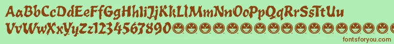 ToxiaFre Font – Brown Fonts on Green Background