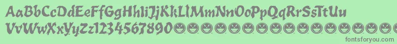 ToxiaFre Font – Gray Fonts on Green Background