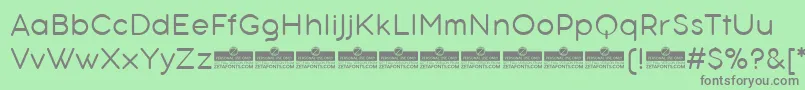 AristotelicaTextLightTrial Font – Gray Fonts on Green Background