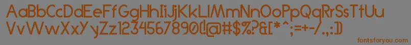Anklada99-Schriftart – Braune Schriften auf grauem Hintergrund
