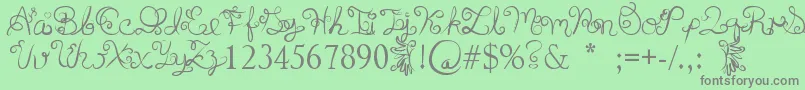 フォントAnyk – 緑の背景に灰色の文字