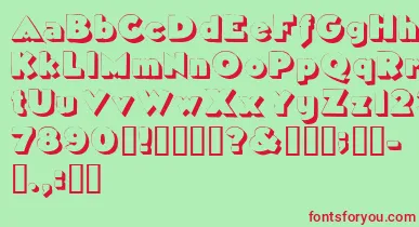Tricorneoutlinessk font – Red Fonts On Green Background