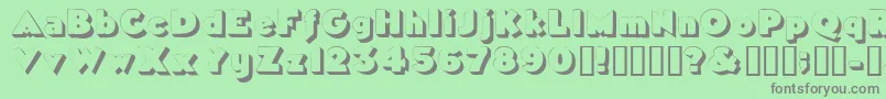 フォントTricorneoutlinessk – 緑の背景に灰色の文字