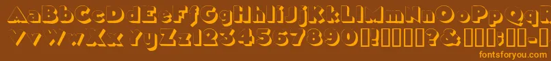 フォントTricorneoutlinessk – オレンジ色の文字が茶色の背景にあります。