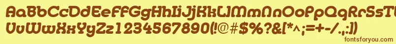 フォントMedflyheavyRegular – 茶色の文字が黄色の背景にあります。