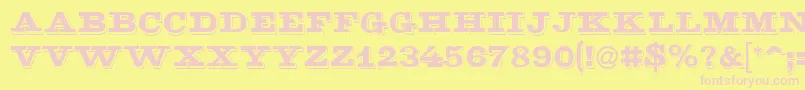 Czcionka LaminacapssskRegular – różowe czcionki na żółtym tle