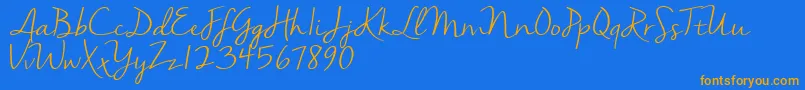 Nellasuedemo-Schriftart – Orangefarbene Schriften auf blauem Hintergrund