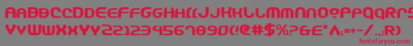 フォントJannisaryShield – 赤い文字の灰色の背景