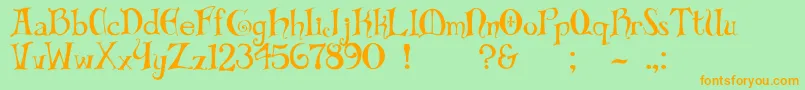 フォントBiblio – オレンジの文字が緑の背景にあります。