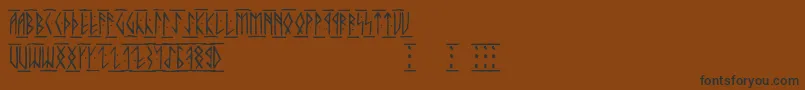 Runicaltc-Schriftart – Schwarze Schriften auf braunem Hintergrund