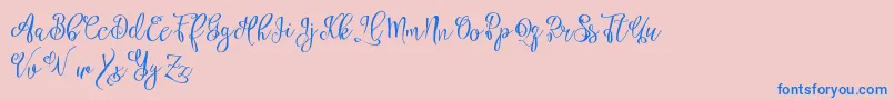 Esztydemo Font – Blue Fonts on Pink Background