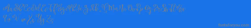 Esztydemo-Schriftart – Graue Schriften auf blauem Hintergrund