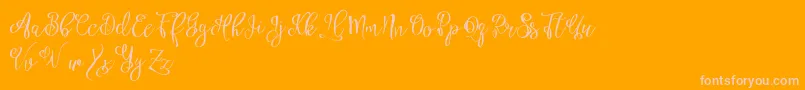 Esztydemo Font – Pink Fonts on Orange Background