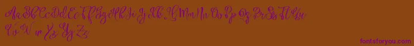 Esztydemo-Schriftart – Violette Schriften auf braunem Hintergrund