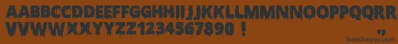 ScaryHalloweenFont-Schriftart – Schwarze Schriften auf braunem Hintergrund