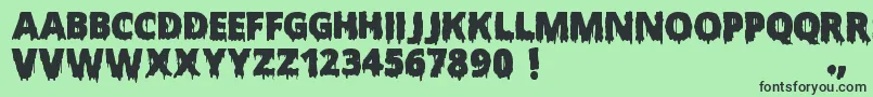 フォントScaryHalloweenFont – 緑の背景に黒い文字