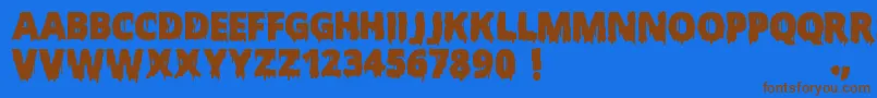 フォントScaryHalloweenFont – 茶色の文字が青い背景にあります。