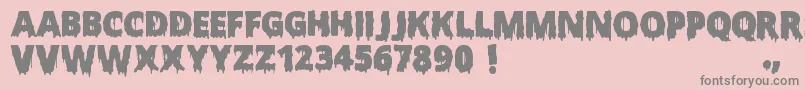 Fonte ScaryHalloweenFont – fontes cinzas em um fundo rosa