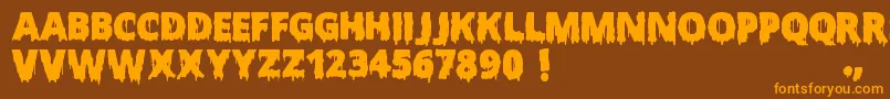 Fonte ScaryHalloweenFont – fontes laranjas em um fundo marrom