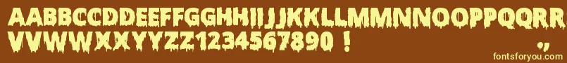 ScaryHalloweenFont-fontti – keltaiset fontit ruskealla taustalla