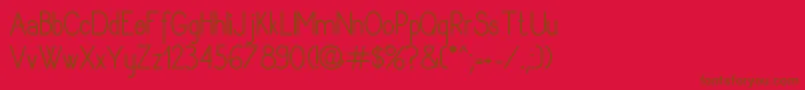 Czcionka Rythmusregular – brązowe czcionki na czerwonym tle
