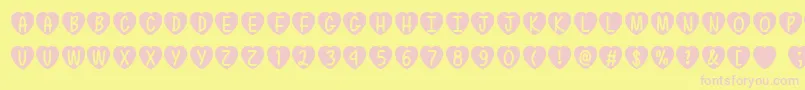 Czcionka MfLoveIsAwesome – różowe czcionki na żółtym tle
