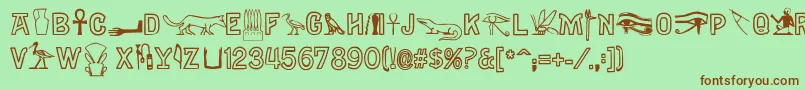 Gyptiennenormal Font – Brown Fonts on Green Background