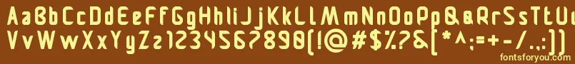 Pamekasanb Font – Yellow Fonts on Brown Background