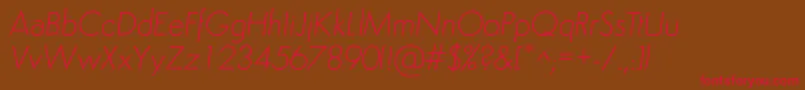 フォントSemplicitaLightItalic – 赤い文字が茶色の背景にあります。