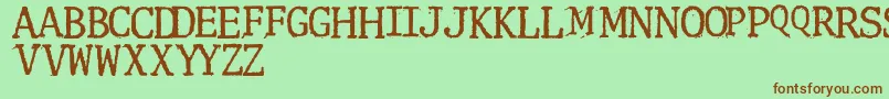 Clunk Font – Brown Fonts on Green Background