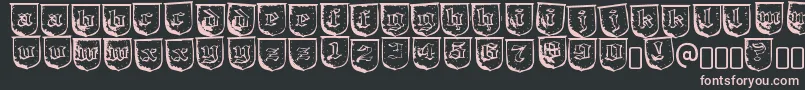 フォントTrollbaitRegular – 黒い背景にピンクのフォント